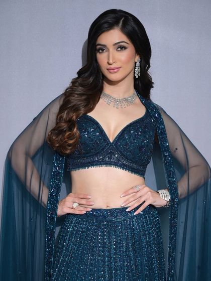 A mesmerizing shimmer eye makeup look, perfect for a sangeet or reception. The blend of sparkle and elegance makes the eyes pop.