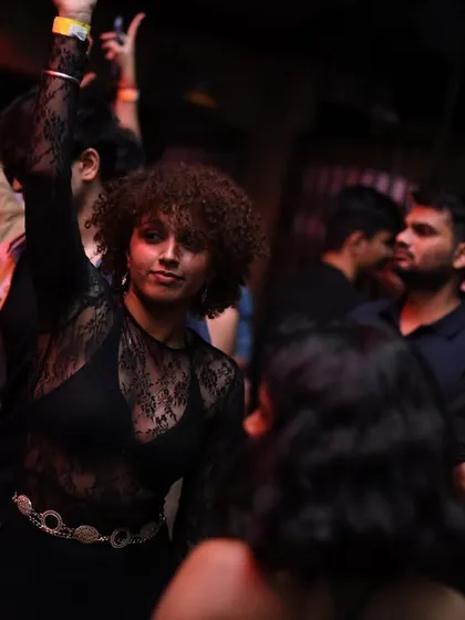 A dancer feeling the rhythm on the floor.