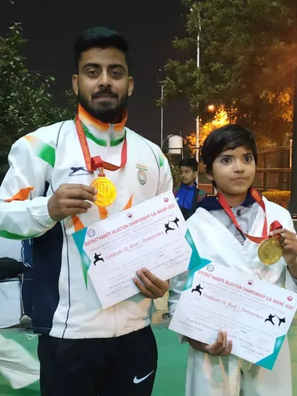 A proud moment for another young champion from our academy. He is holding his gold medal and certificate after a victorious performance at the district selections.