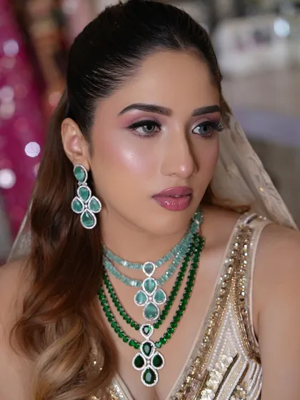 This look is all about creating a flawless canvas that lets the bride's natural beauty shine through.