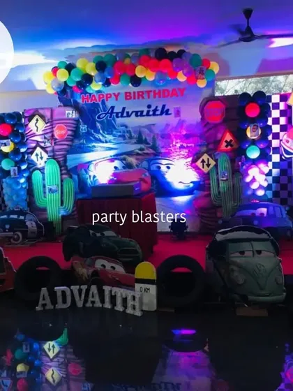 A high-energy Cars themed birthday party. We transformed the space into a racetrack with checkered flags, traffic signs, and cutouts of Lightning McQueen and his friends.
