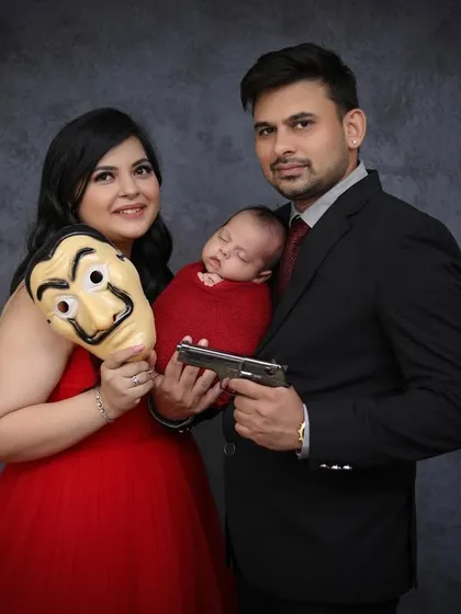 A fun and creative themed newborn shoot for a family of Money Heist fans. We love collaborating on unique ideas that reflect your personality and story.