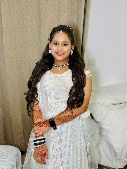 A full-length shot of the teenage client, looking fresh and beautiful.