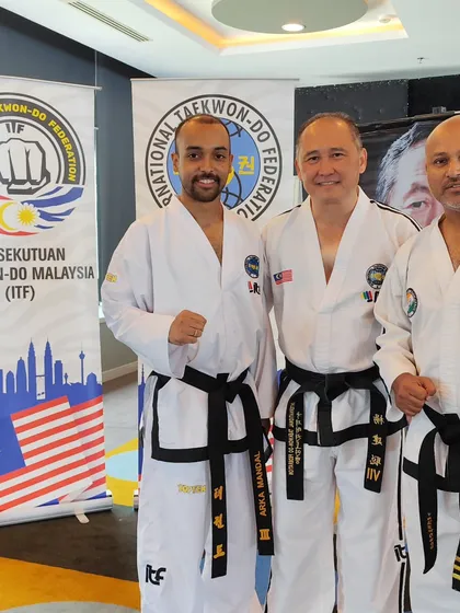 Our Chief Instructor with international masters, fostering relationships within the global ITF community.