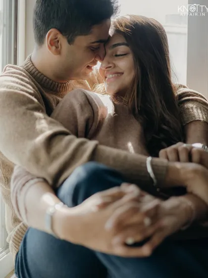 Sometimes, the most meaningful location is home. This cozy, indoor pre-wedding portrait is all about capturing the warmth and comfort of a shared life, bathed in soft window light. It’s intimate, real, and deeply personal.
