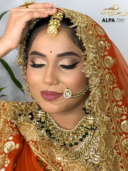The bride's expression of serene beauty, with makeup that enhances her features naturally.
