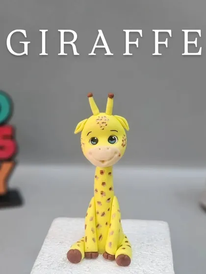 Our cute fondant giraffe. In the class, we cover how to make the long neck stable and paint the characteristic spots.