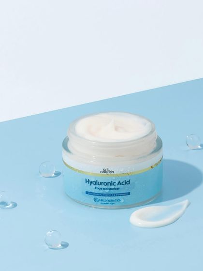 This close-up on the Hyaluronic Acid moisturizer shows off its rich, creamy texture. We added clear hydrogel balls to represent hydration, reinforcing the product's main benefit in a visually interesting way.