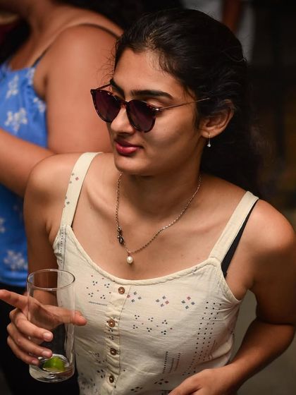 A cool and casual vibe from a guest enjoying the music.