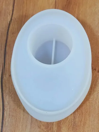 Here is another view of our round T-light holder silicone mould. It's a versatile mould that can be used with various materials to create elegant home decor.