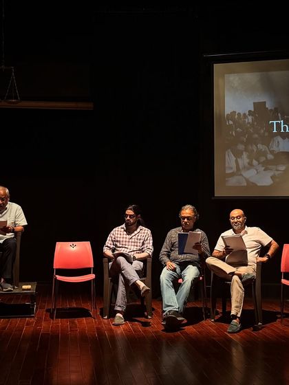 Actors sit together during a script reading for "Inherit the Wind."