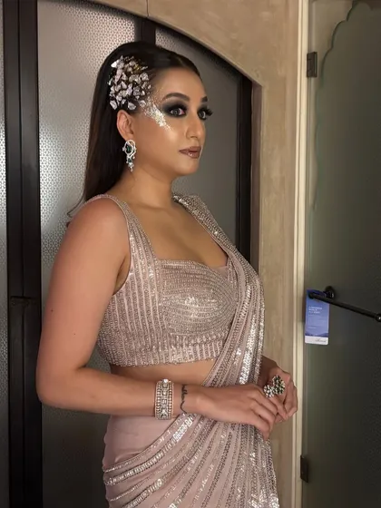 The sleek side-tuck with soft waves is a sophisticated choice for cocktail parties and red carpet events. I teach how to achieve that smooth, polished top section while creating glamorous waves, and how to place statement accessories for maximum impact.