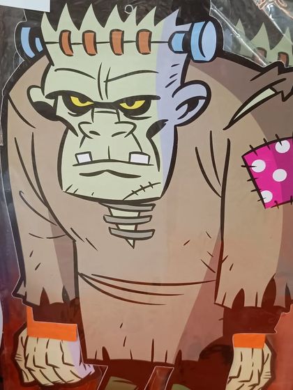 A large Frankenstein's monster cutout decoration. This classic movie monster is perfect for decorating walls or doors to welcome your party guests.