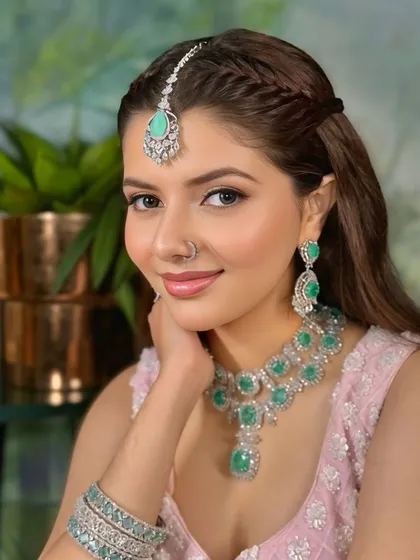 A close-up on the flawless, radiant glow we created for this reception look. The skin looks luminous, and the soft makeup enhances her natural features.