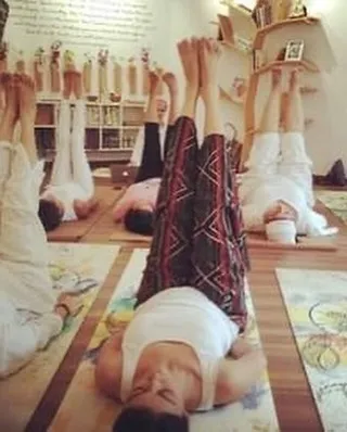 A moment from a past Winter Solstice workshop, showing participants in an inversion. These practices help us connect with the powerful pranic value of the solstices.