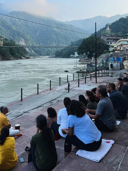 Leading a morning meditation session on the ghats of the Ganges. Starting the day with stillness and intention sets a peaceful tone for all our activities.
