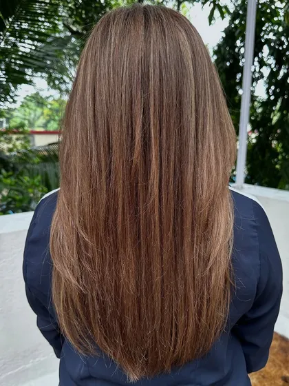 A classic 'Ash Blonde'. This is a great option for those who want to go lighter but prefer cooler tones over warm, golden shades. It's sophisticated and chic.