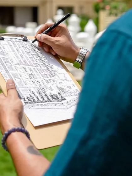 A close-up of my hand as I work on a detailed architectural sketch. This is my focus, my meditation.