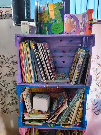 Our Magic Crates are mini-libraries, stacked and filled with a diverse collection of books. They are designed to be colorful, inviting, and easy to access for little hands.