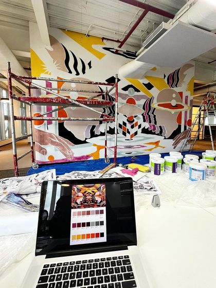 A behind-the-scenes look at the painting process. Here you can see the color-blocking stage, with my laptop showing the digital reference and color palette.