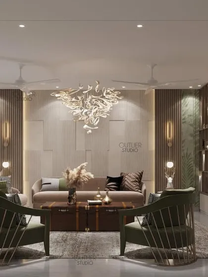 Home is where the heart is. This living room combines comfortable seating with a stunning sculptural chandelier and touches of green, creating a space that is both stylish and welcoming.