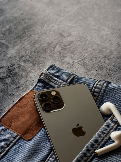 This is one of my favorites from the series. The iPhone and AirPods are casually tucked into the pocket of a pair of jeans, creating a cool, effortless, and relatable lifestyle image.