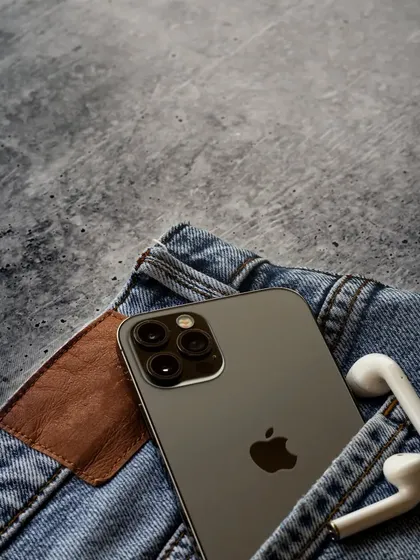 This is one of my favorites from the series. The iPhone and AirPods are casually tucked into the pocket of a pair of jeans, creating a cool, effortless, and relatable lifestyle image.
