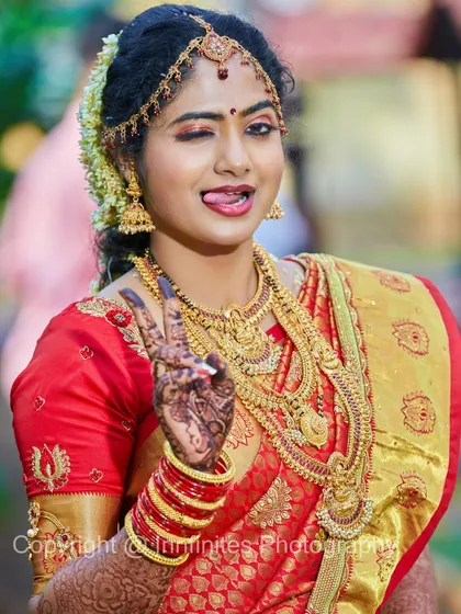 I love it when the bride's personality shines through. This fun, playful shot adds a wonderful touch of character to the wedding album.