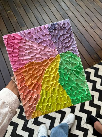 A finished abstract texture piece with a rainbow of colors. The possibilities with this medium are endless.