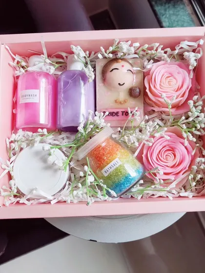 A closer look at the "Bride to be" hamper, showing the personalized soap and rainbow bath salts.