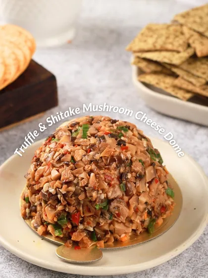 Rich and earthy, our Truffle & Shiitake Mushroom Cheese Dome is a savory delight. It's packed with finely chopped mushrooms and infused with truffle for a deep, umami flavor.