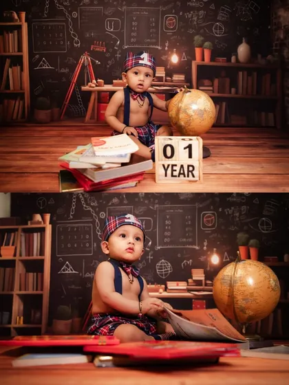 A 'little scholar' themed first birthday shoot. This setup with a chalkboard, books, and a globe is a creative way to mark a special milestone.
