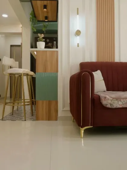 A glimpse from the living room towards the breakfast bar, showing how different spaces are connected through a cohesive design language.