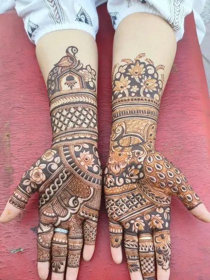 A lovely design with peacock and floral motifs.