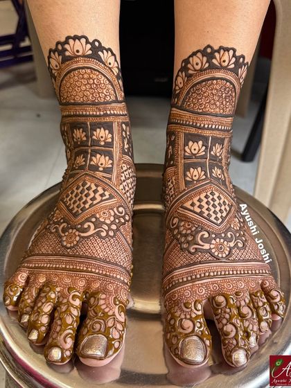 A very dense and full bridal feet design, perfect for the bride who wants complete coverage with traditional floral and architectural motifs.
