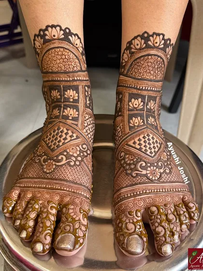 A very dense and full bridal feet design, perfect for the bride who wants complete coverage with traditional floral and architectural motifs.