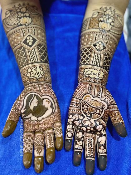 A lovely baby shower design featuring a mother and child portrait on one palm and a baby in a cradle on the other. The words "Boy" and "Girl" add to the fun and anticipation.