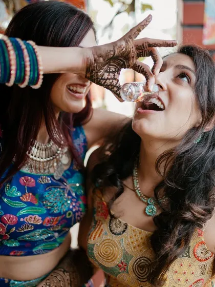 More fun and games at the Mehendi. It's all about creating a party atmosphere.