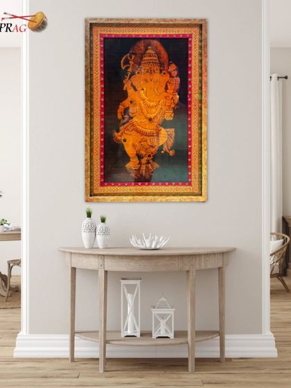 Placed in a hallway, the framed Ganesha painting creates a welcoming and auspicious entryway. Our framing ensures the piece has a commanding presence that elevates the entire space.