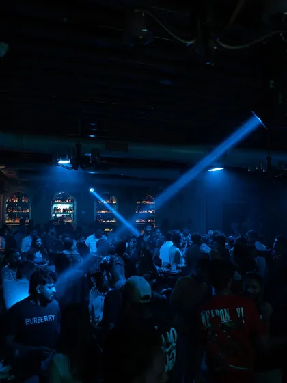 The club is packed, and the light beams are cutting through the darkness. This is the atmosphere I build every weekend.
