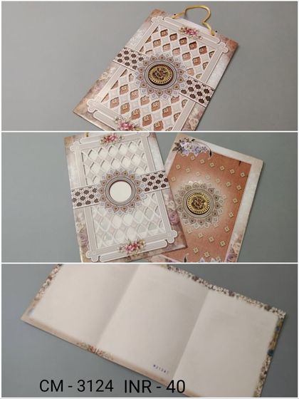 A tri-fold invitation with a rope handle, featuring a laser-cut lattice design and a central emblem. The card opens up to provide ample space for all your wedding information.