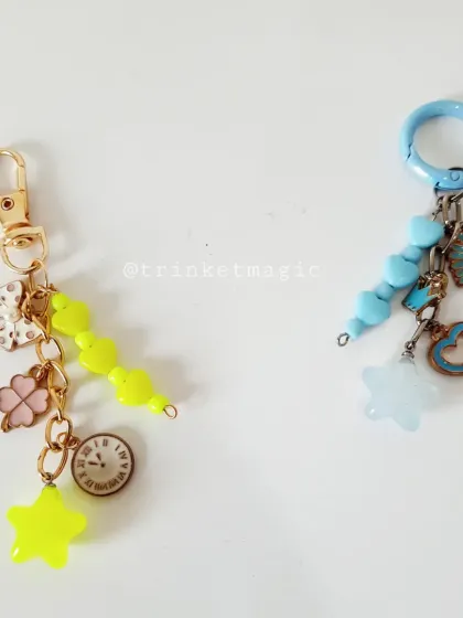 Tiny trinkets, big emotions. These two custom keychains, one in sunny yellow and one in pastel blue, were created to match two different vibes.