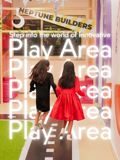 Step into the world of innovative play. Two friends hold hands as they run towards their next adventure on our indoor track.