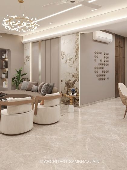 This living room is a celebration of calm, curated design, where neutral hues and handpicked artifacts come together in perfect balance. A soothing palette of soft beige, taupe, and warm greys forms the foundation, allowing textures and materials to shine.