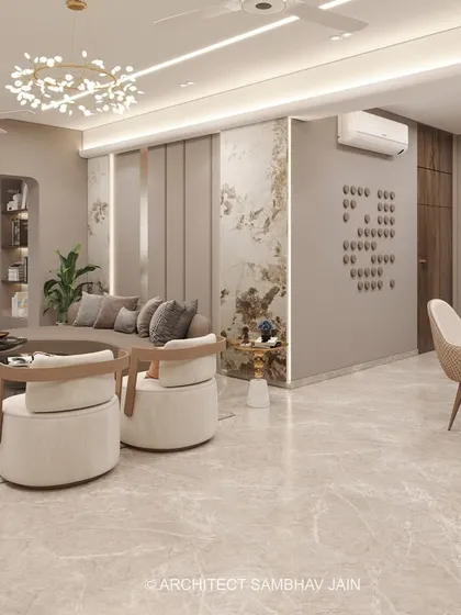 This living room is a celebration of calm, curated design, where neutral hues and handpicked artifacts come together in perfect balance. A soothing palette of soft beige, taupe, and warm greys forms the foundation, allowing textures and materials to shine.