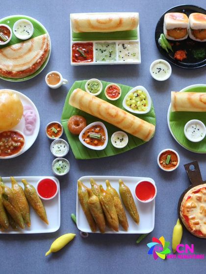 A collection of my most popular miniatures, including dosa, vada pav, chole bhature, and pizza.