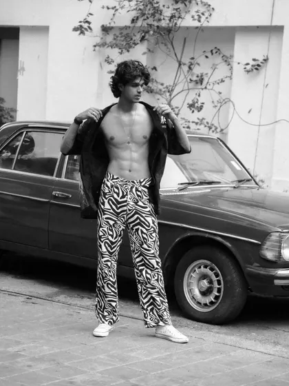This series features a male model with a vintage Mercedes, shot in both color and black and white. It showcases a cool, retro vibe perfect for a fashion editorial or model portfolio.