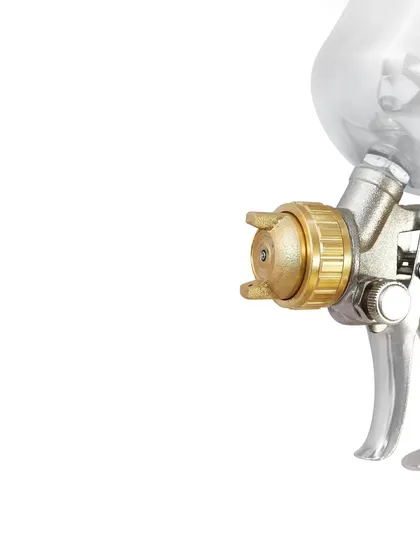 An extreme close-up focusing on the product's nozzle, composed with negative space for adding text or technical specifications in a graphic design.