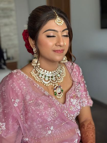 Another angle of the soft and romantic eye makeup. The blending is seamless, creating a dreamy effect that is perfect for a pastel-themed wedding.