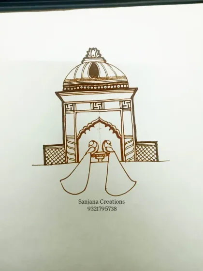 The first step of a bridal startup design on paper. This shows the basic outline of the palace and peacock motif.